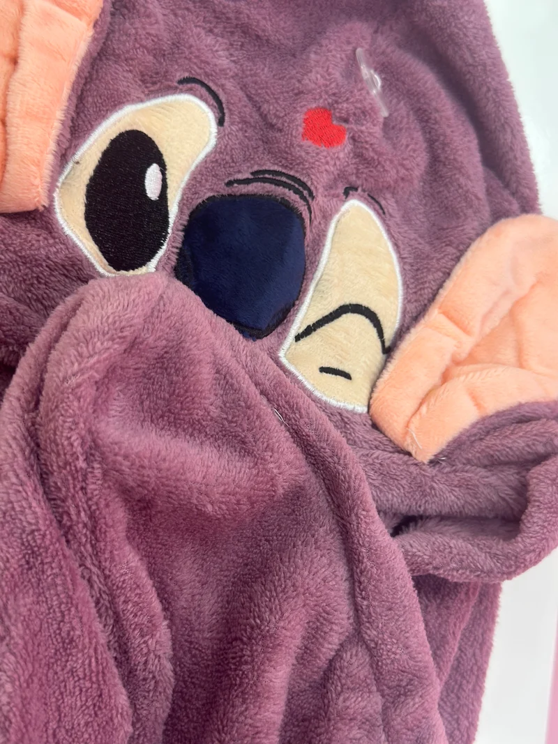 Stitch twist microfiber towel