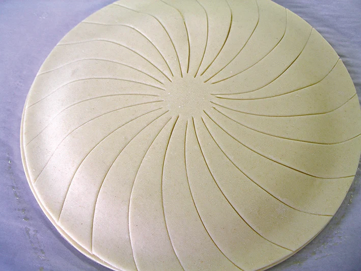 Découpoir inciseur à galette